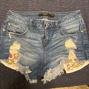 Jean shorts, from Francesca’s, embroidered pockets.